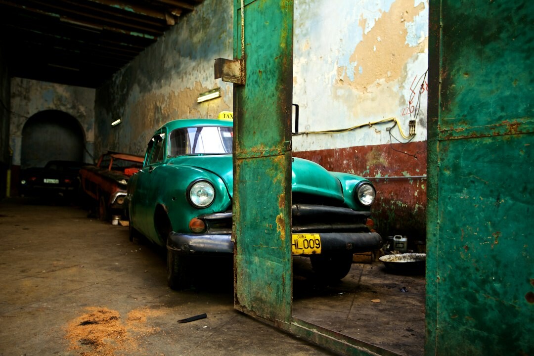 Fascinating old garage filled with forgotten classic automobiles in Montevideo
