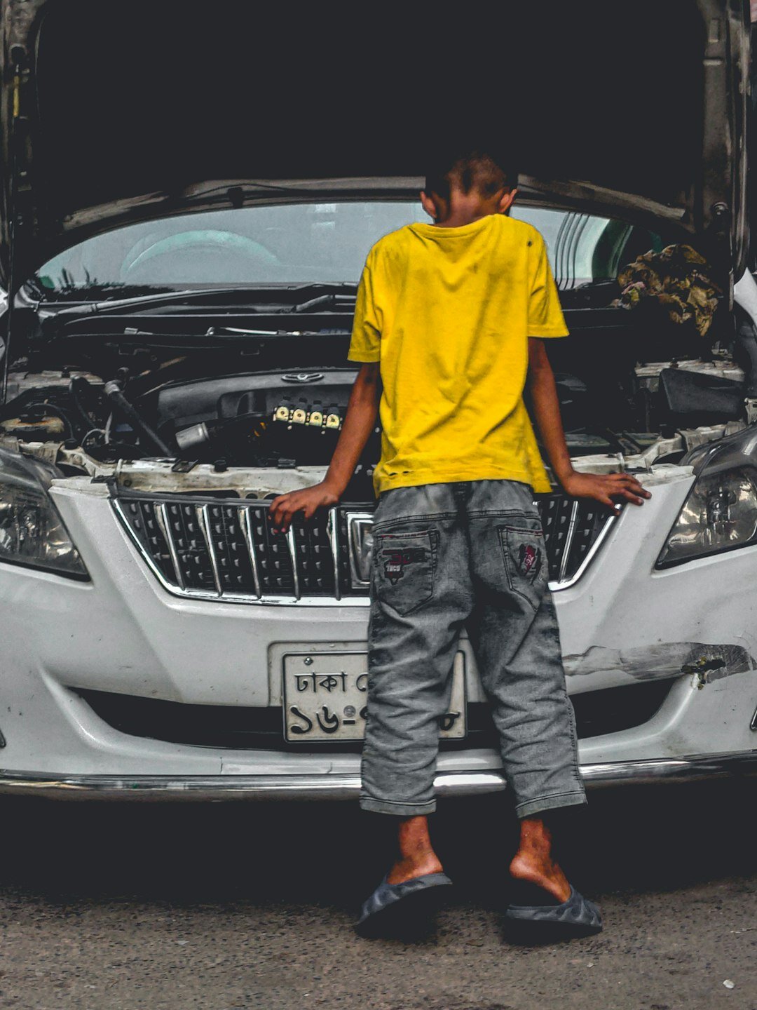 mechanic working on car