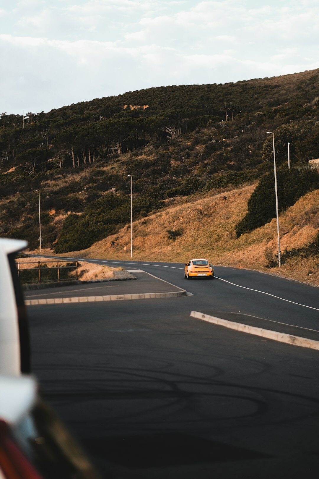 luxury supercar on scenic road